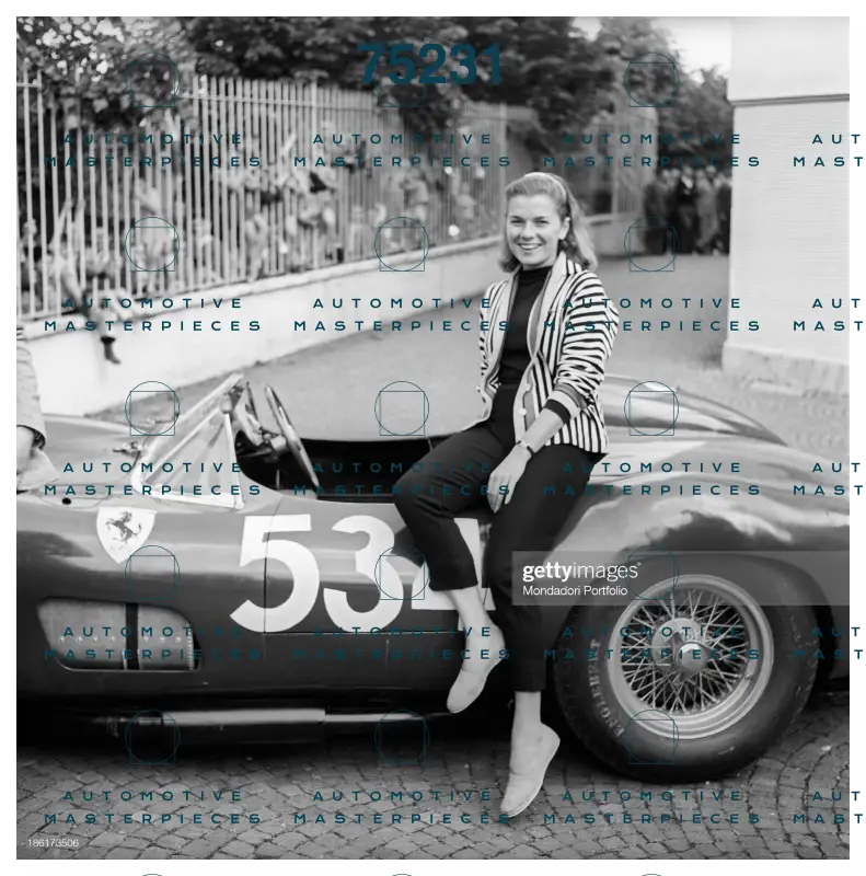 GETTY 186173506_louise-collins-posing-smiling-leaned-on-the-car-driven-by-her-husband-picture-id186173506.jpg