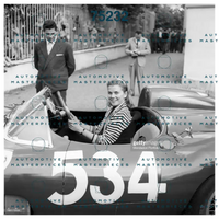 GETTY 186173508_louise-collins-posing-smiling-at-the-wheel-of-the-car-driven-by-her.jpg