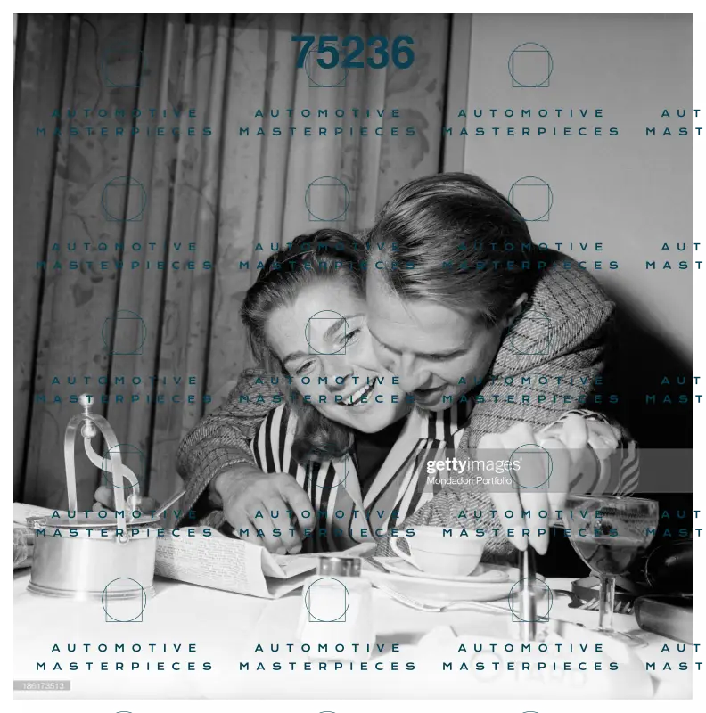 GETTY 186173513_british-racing-driver-peter-collins-hugging-his-american-wife-louis.jpg