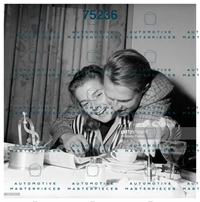 GETTY 186173513_british-racing-driver-peter-collins-hugging-his-american-wife-louis.jpg