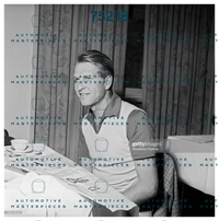 GETTY 186173518_british-racing-driver-peter-collins-smiling-seated-at-the-table-at-.jpg