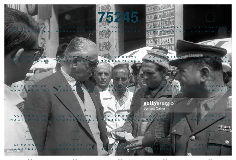 826751468_enzo-ferrari-peter-collins-mille-miglia-italy-12-may-1957-enzo-and-.jpg